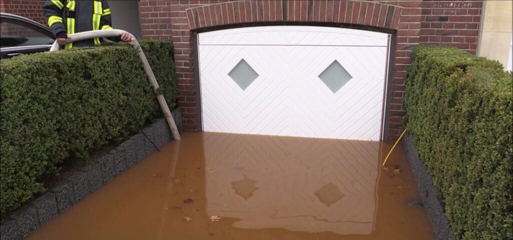 how to seal a garage door from flooding