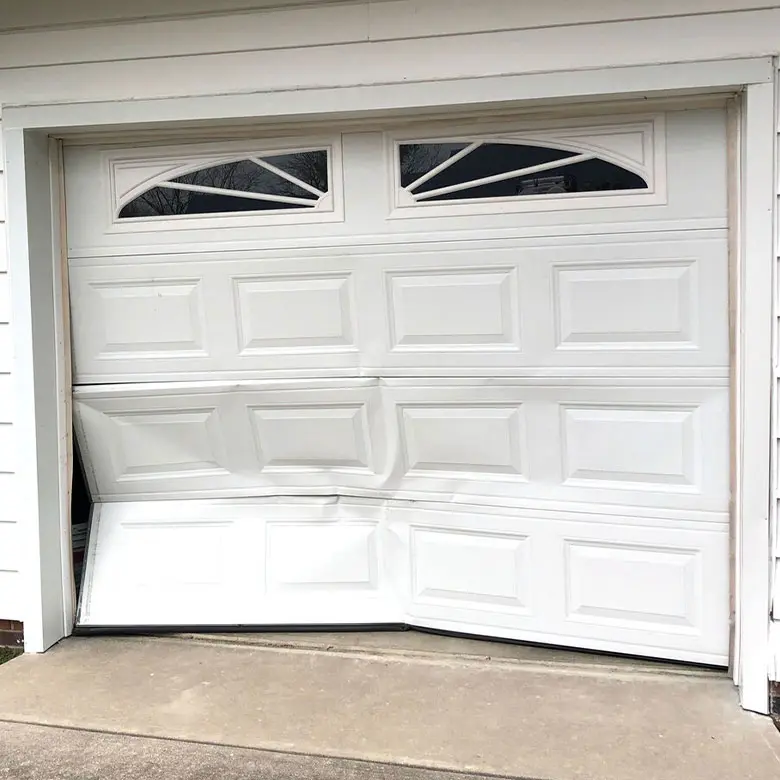 can a bent garage door be fixed