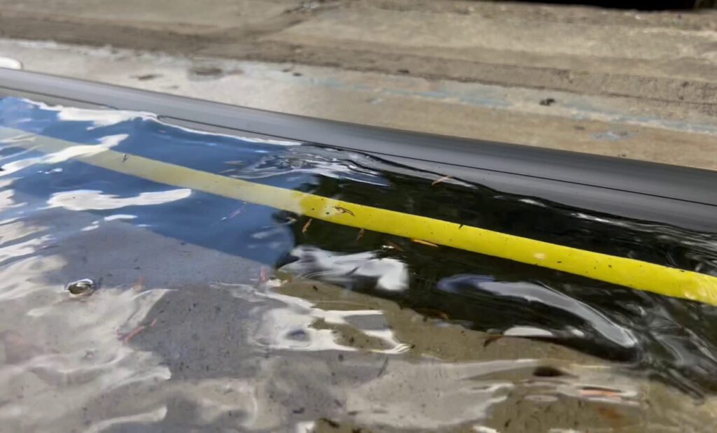 how to keep water from coming in under garage door