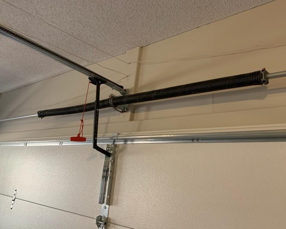 how to wind garage door spring