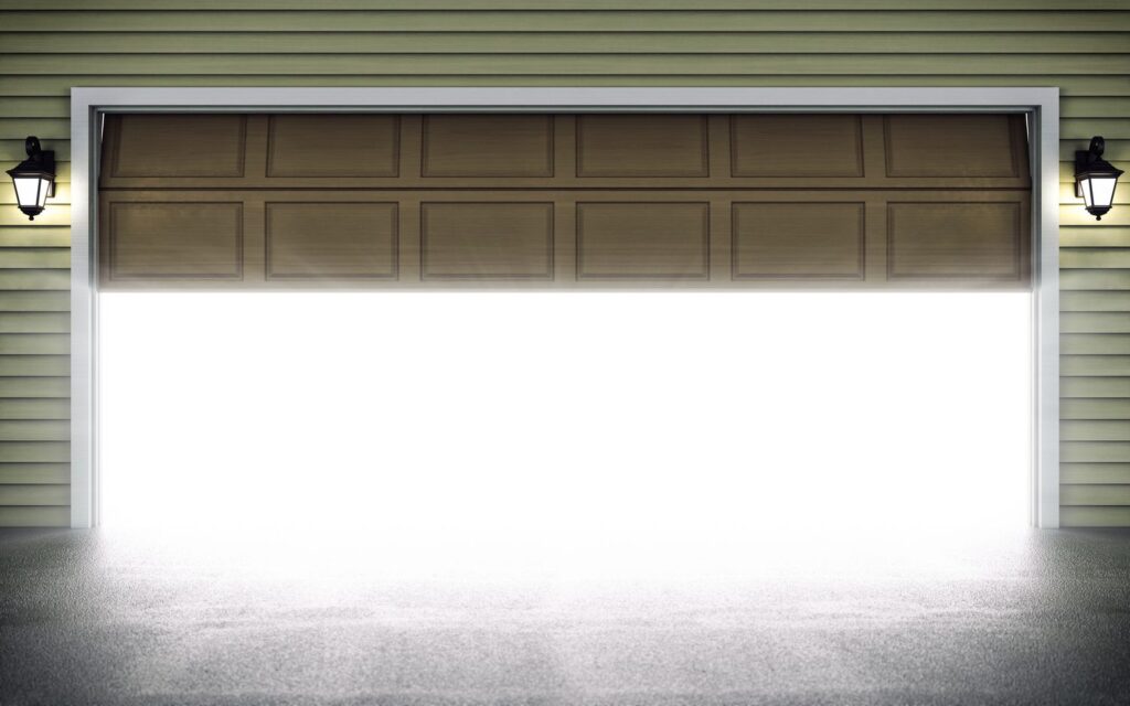 what causes a garage door to open on its own