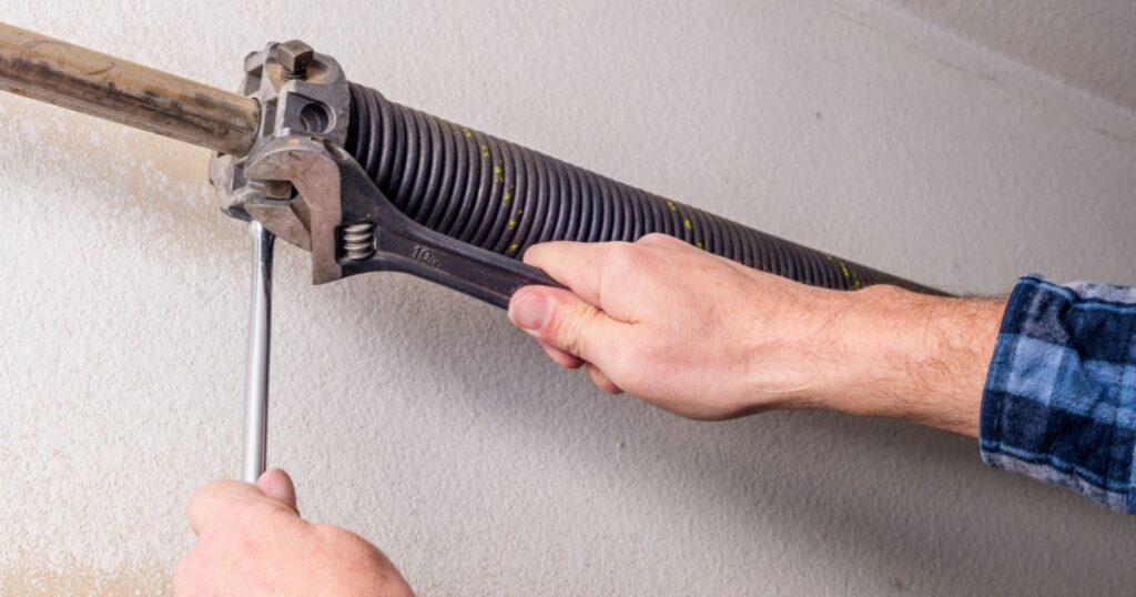 How Do You Adjust Spring Tension On A Garage Door