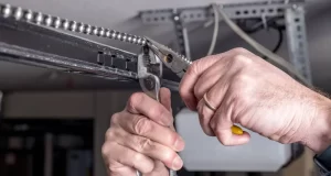 How To Reattach A Garage Door Chain